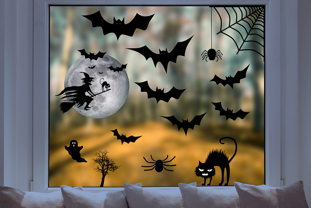 Papier peint photo - Décoration d'Halloween : sorcière, chauve-souris, araignées et chat devant la pleine lune