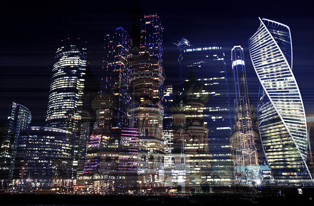 Papier peint photo - Skyline de nuit avec des gratte-ciel modernes brillamment éclairés